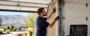 Garage Door Technician Lubricating Garage Door Components